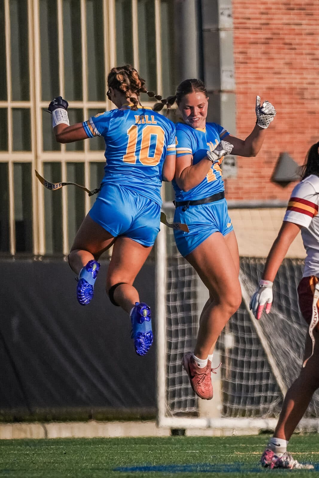 Tenley Hill celebrating with teammate Addy after a touchdown