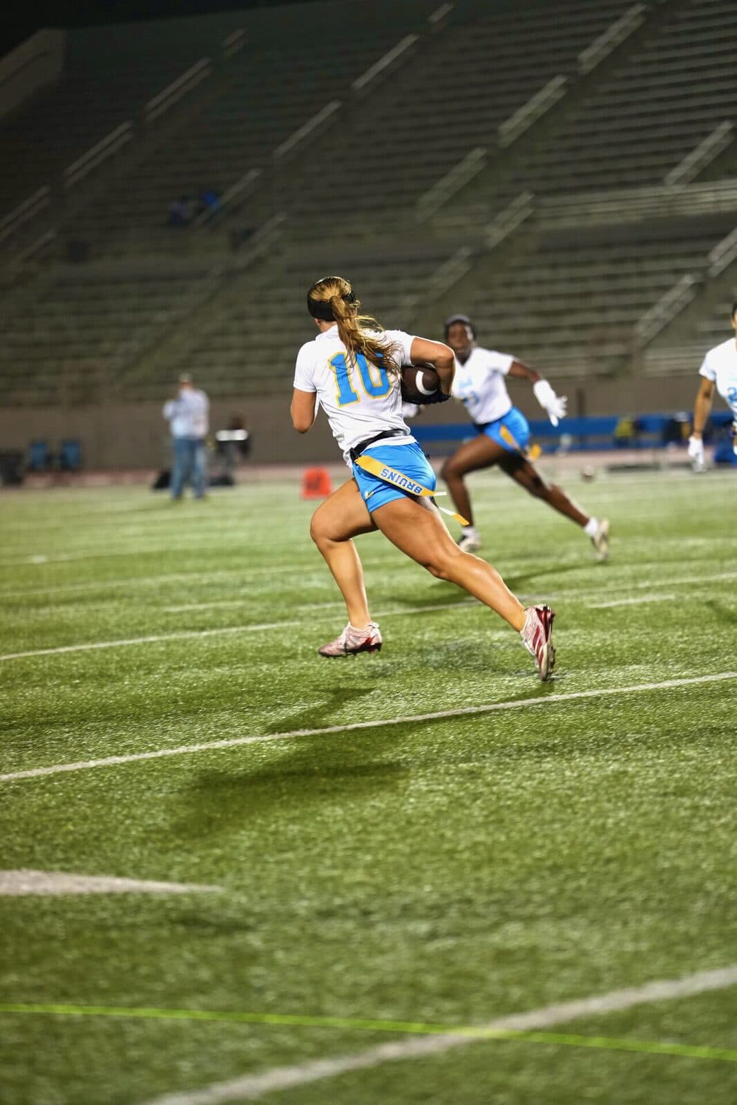Tenley Hill #10 — full stride under the lights